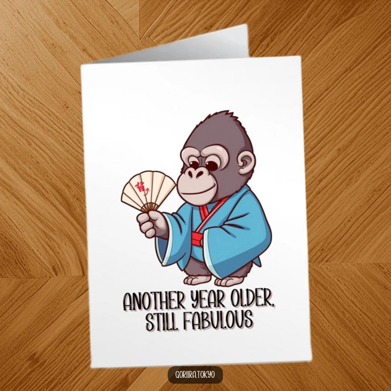 Funny Free Printable Birthday Card: Gorilla in blue formal kimono holding a delicate fan with grace, celebrating a birthday.